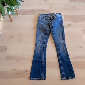 Miss Me Mid Rise Boot Cut Jeans. Slim fit